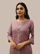 Self jacquard kurti with lining and fine embroidered detailing